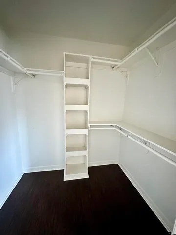 a view of an empty walk in closet
