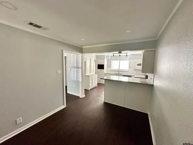 a room with a hard wood floor