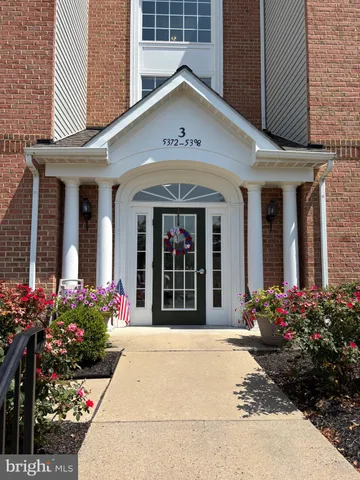 a view of a refrigerator and a window