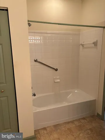a bathroom with a toilet and a sink