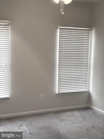 a view of a room with rack on the wall