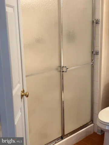 a stove top oven sitting inside of a kitchen