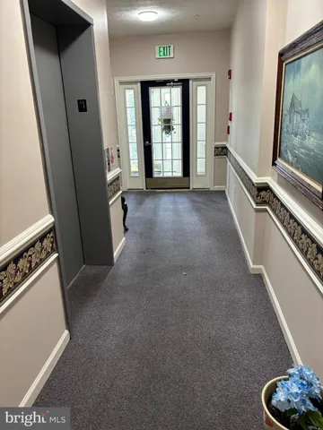 a view of front of a house with a yard