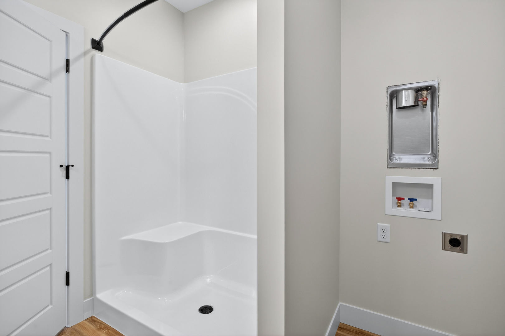 412 North 2nd Street Eldridge, IA 52748 - Photo 26 of 30 a bathroom with a glass shower door