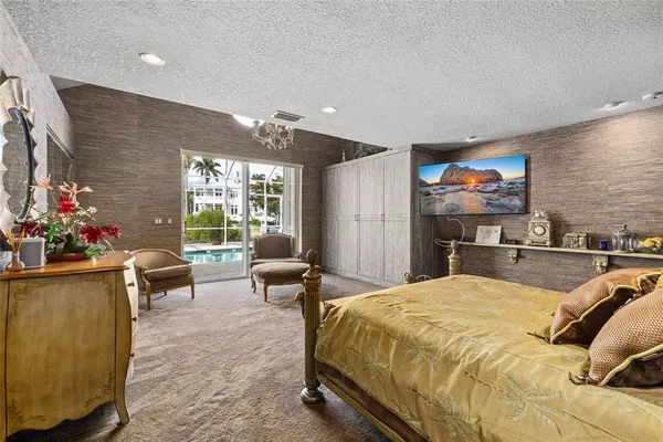 a bed room with a bed and furniture