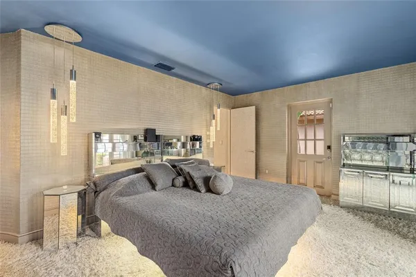 a large bathroom with a sink and a mirror