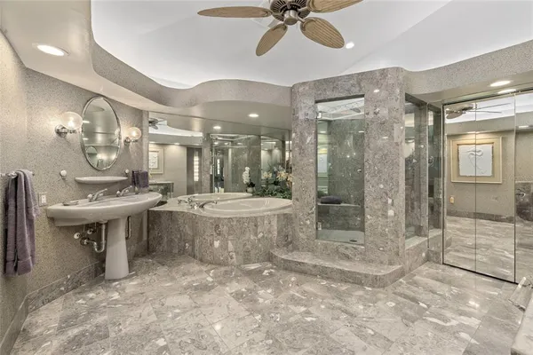 a bedroom with two beds and painted walls