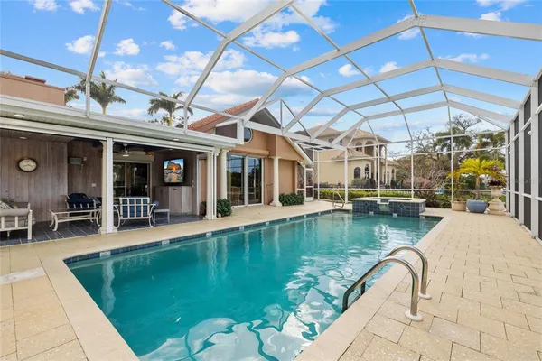 a view of a swimming pool with a patio