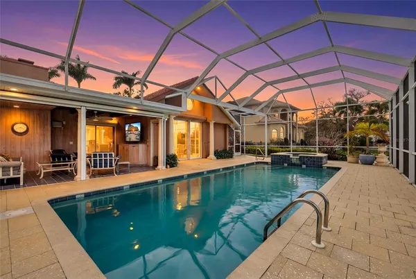 a view of a swimming pool with a patio