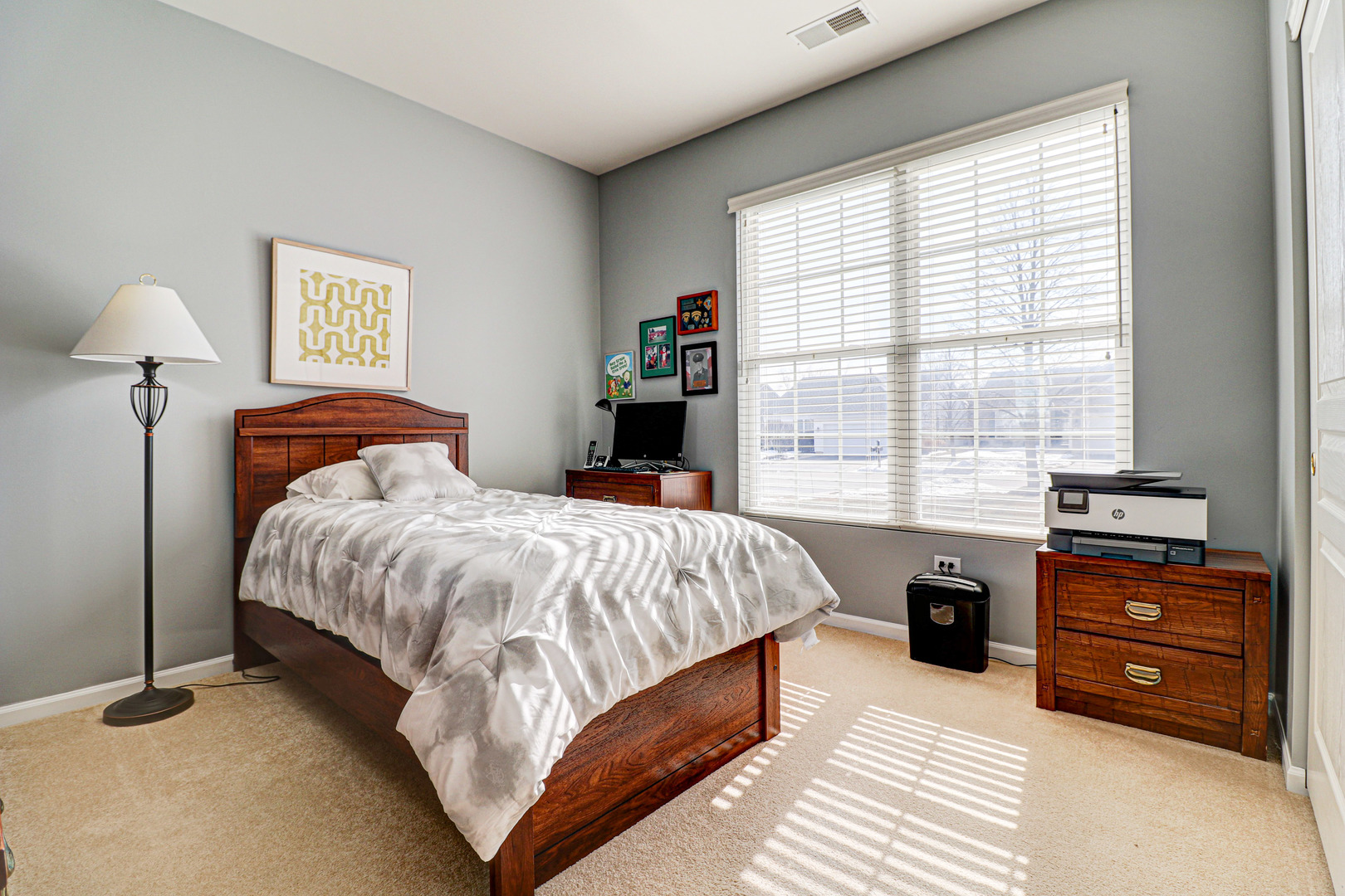 13616 Fallow Drive Huntley, IL 60142 - Photo 11 of 21 a bedroom with a bed and a window