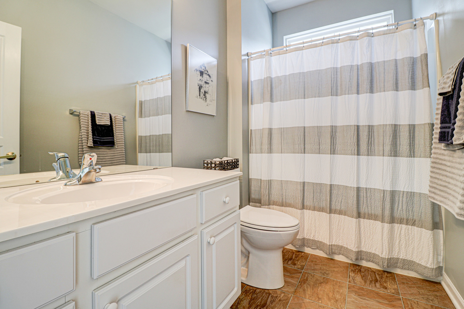 13616 Fallow Drive Huntley, IL 60142 - Photo 12 of 21 a bathroom with a sink toilet and shower