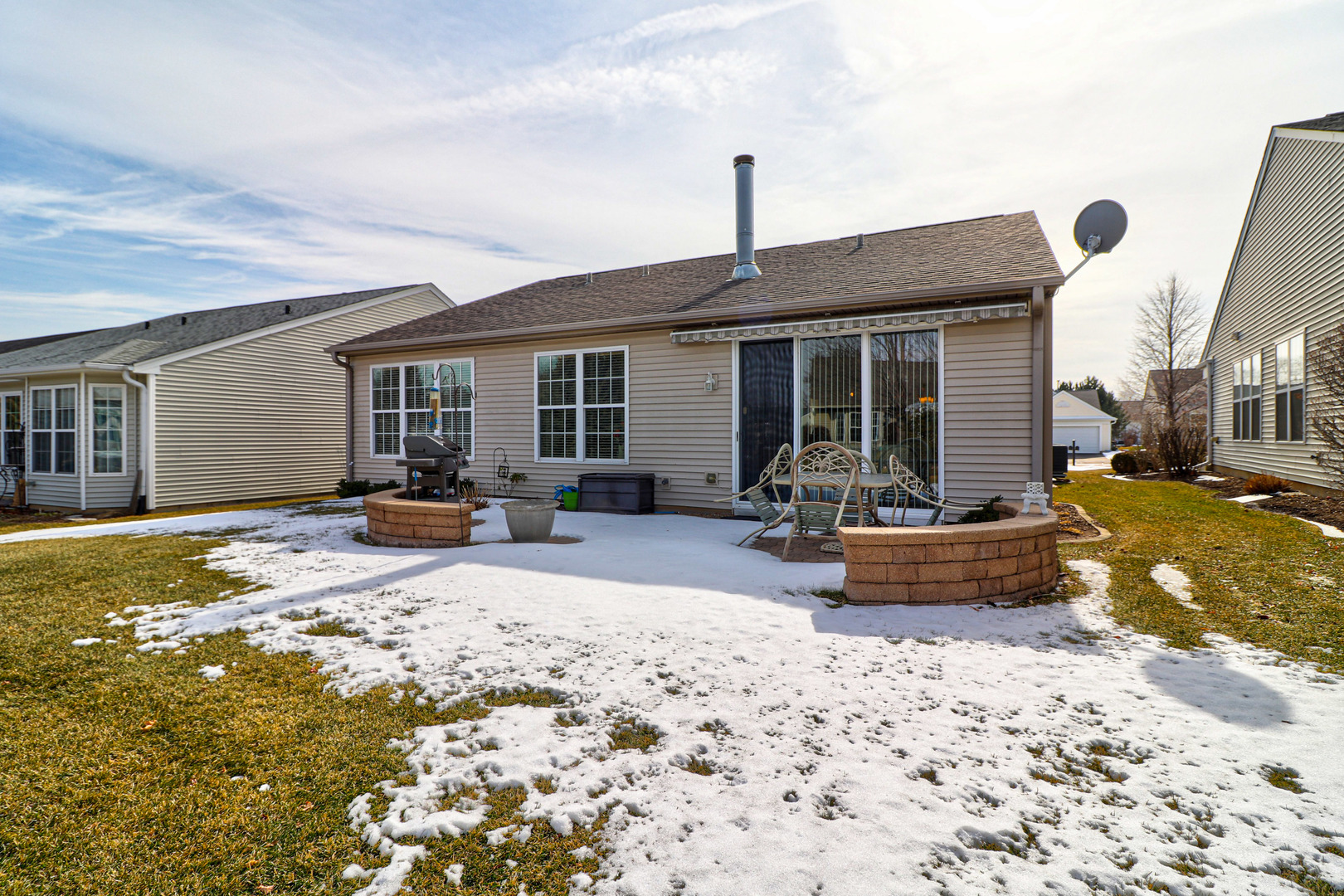 13616 Fallow Drive Huntley, IL 60142 - Photo 20 of 21 a view of a house with backyard and sitting area