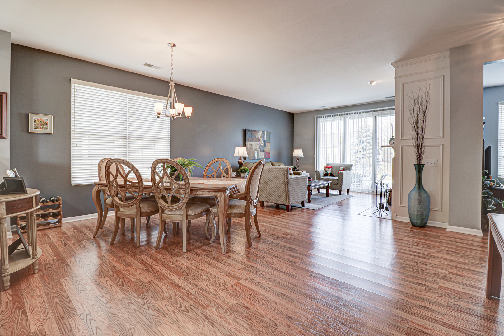 13616 Fallow Drive Huntley, IL 60142 - Photo 2 of 21 a view of a dining room with furniture window and wooden floor