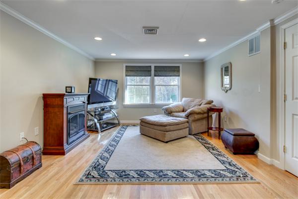27 A Lawton Road, Unit A Shirley, MA 01464 - Photo 23 of 30 a living room with furniture rug and window