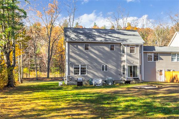 27 A Lawton Road, Unit A Shirley, MA 01464 - Photo 29 of 30 a view of a house with a swimming pool
