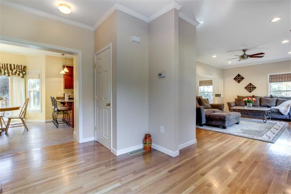 27 A Lawton Road, Unit A Shirley, MA 01464 - Photo 3 of 30 a living room with furniture and a wooden floor