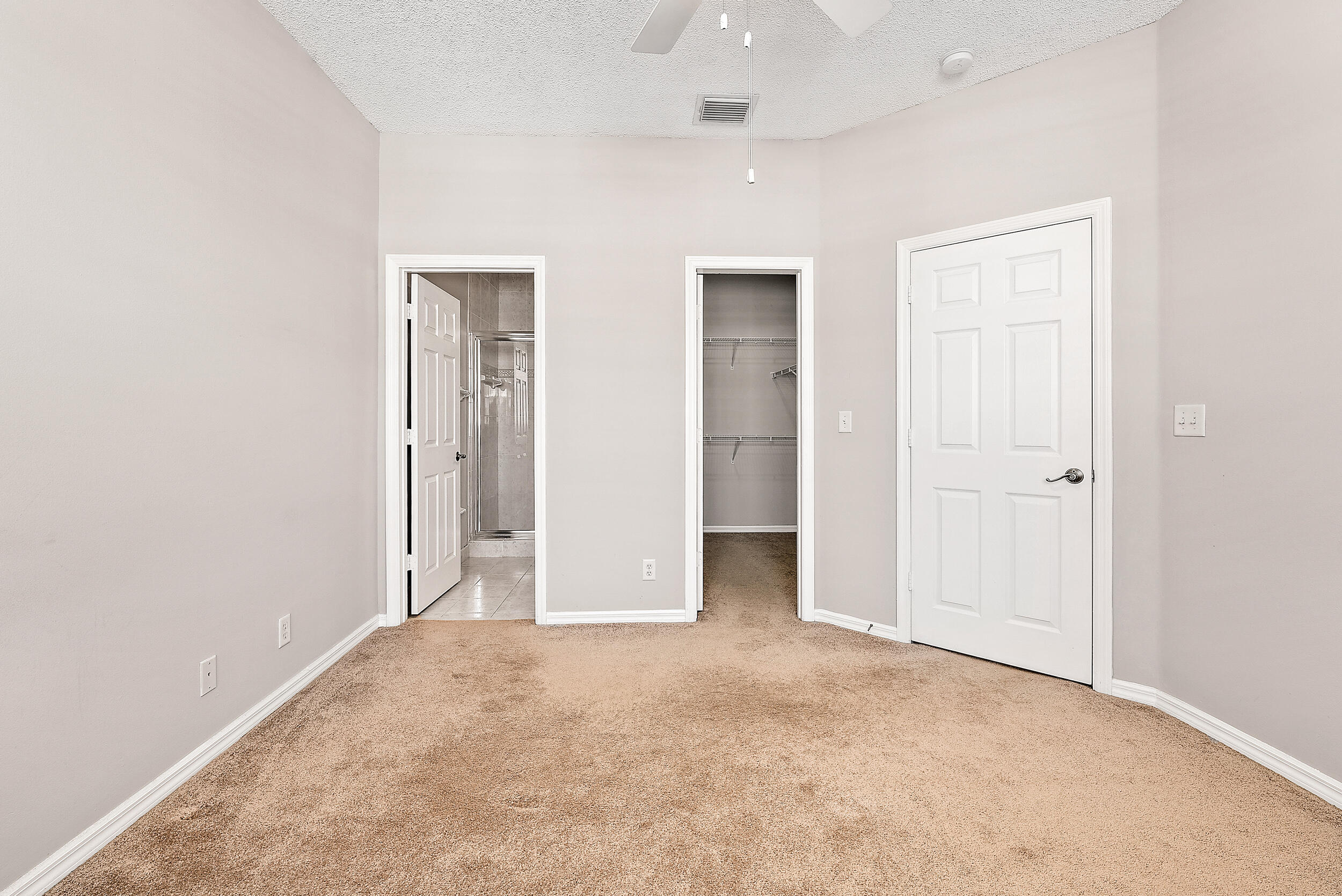 112 Lighthouse Circle, Unit J Tequesta, FL 33469 - Photo 9 of 18 Master Bedroom