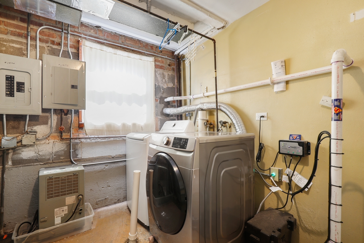 14929 Cleveland Avenue Posen, IL 60469 - Photo 19 of 23 a view of a storage & utility room with washer and dryer