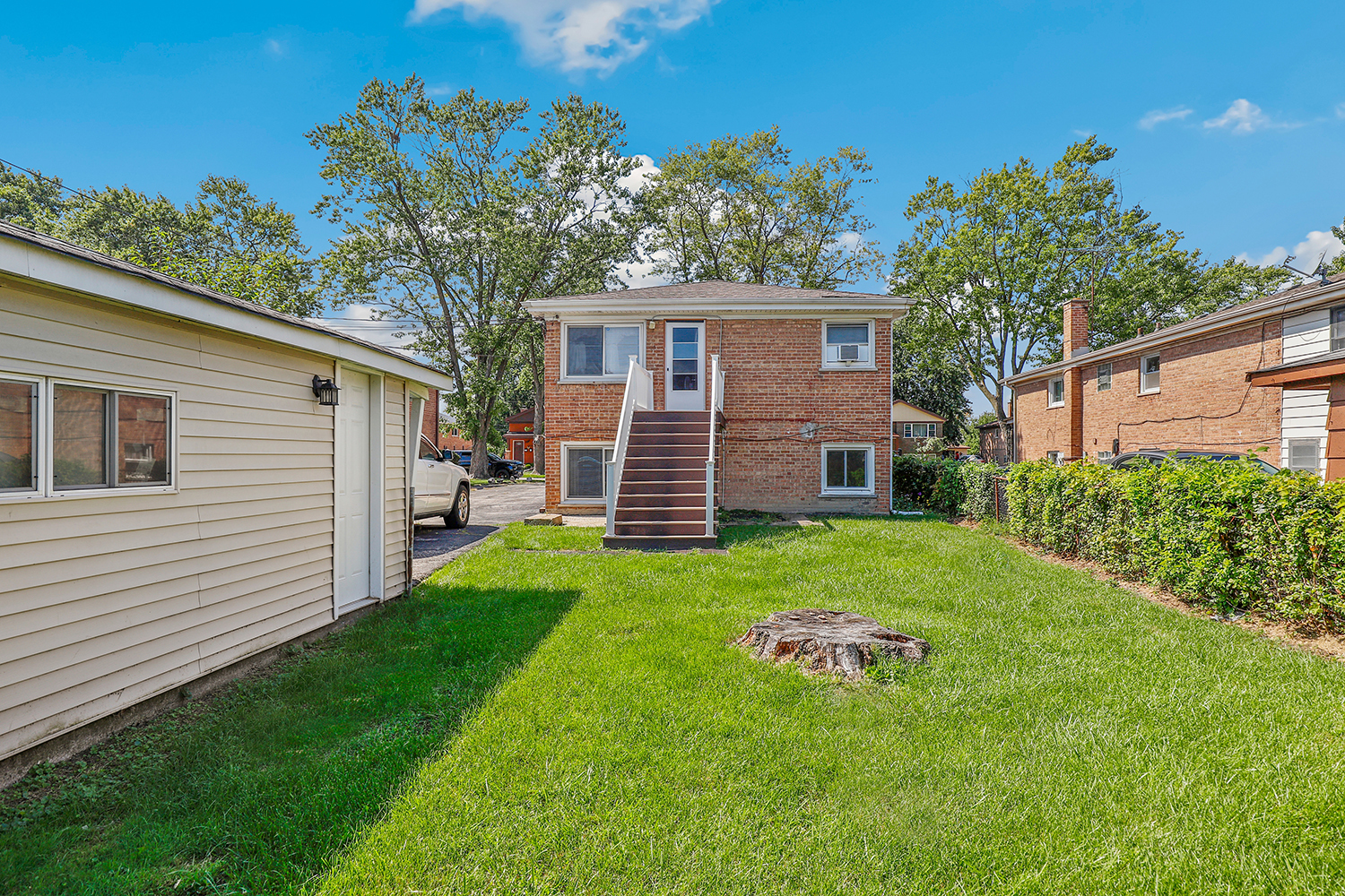14929 Cleveland Avenue Posen, IL 60469 - Photo 21 of 23 a view of a back yard of the house