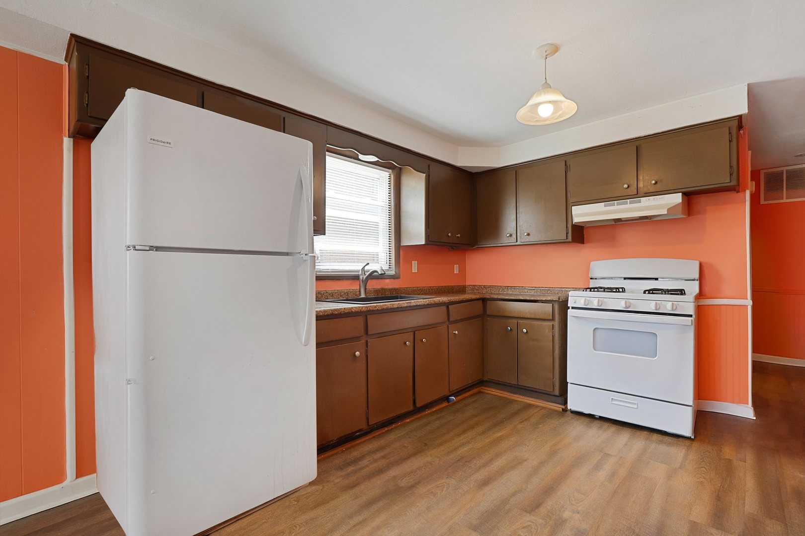 14929 Cleveland Avenue Posen, IL 60469 - Photo 3 of 23 a kitchen with stainless steel appliances a refrigerator sink and microwave