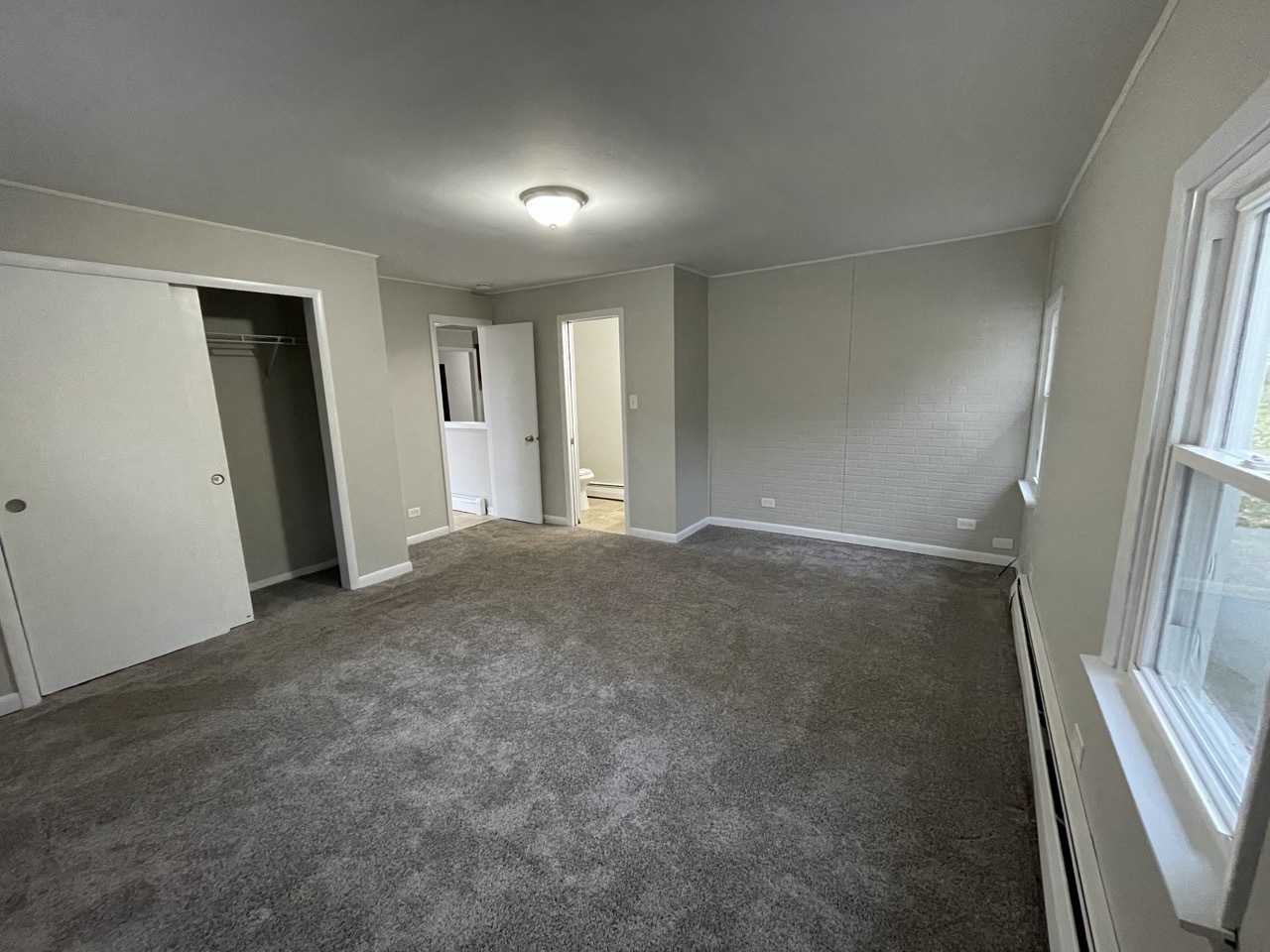 7701 Carleton Drive Spring Grove, IL 60081 - Photo 8 of 13 an empty room with windows