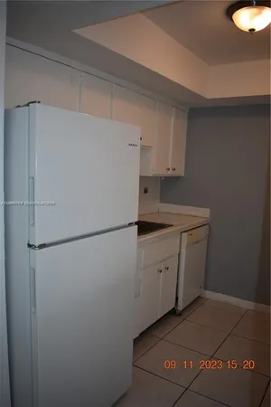 a bathroom with a shower and toilet