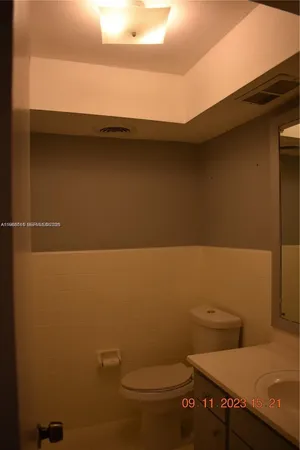 a bathroom with a sink and a toilet