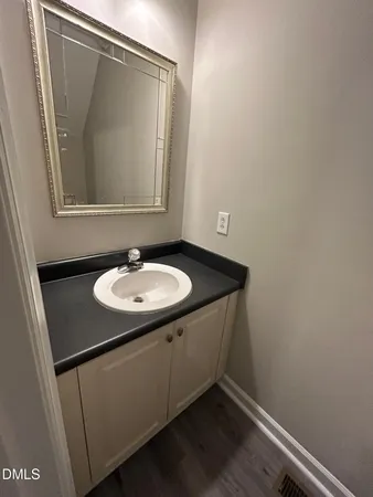 a sink with a mirror