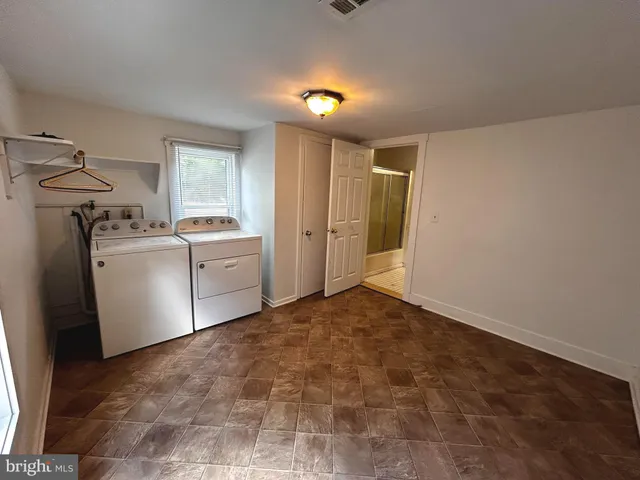a view of utility room with washer and dryer