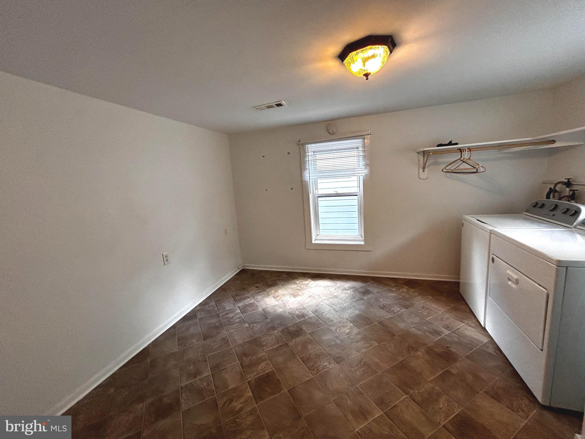 703 White Oak Road White Post, VA 22663 - Photo 13 of 23 a view of an empty room with a window