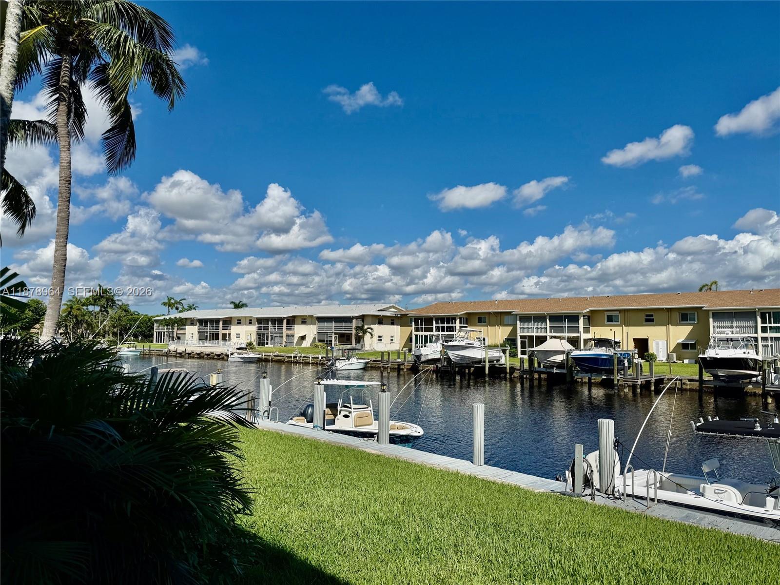 930 Southeast 9th Avenue, Unit 8 Pompano Beach, FL 33060 - Photo 6 of 26 a view of a lake with a city