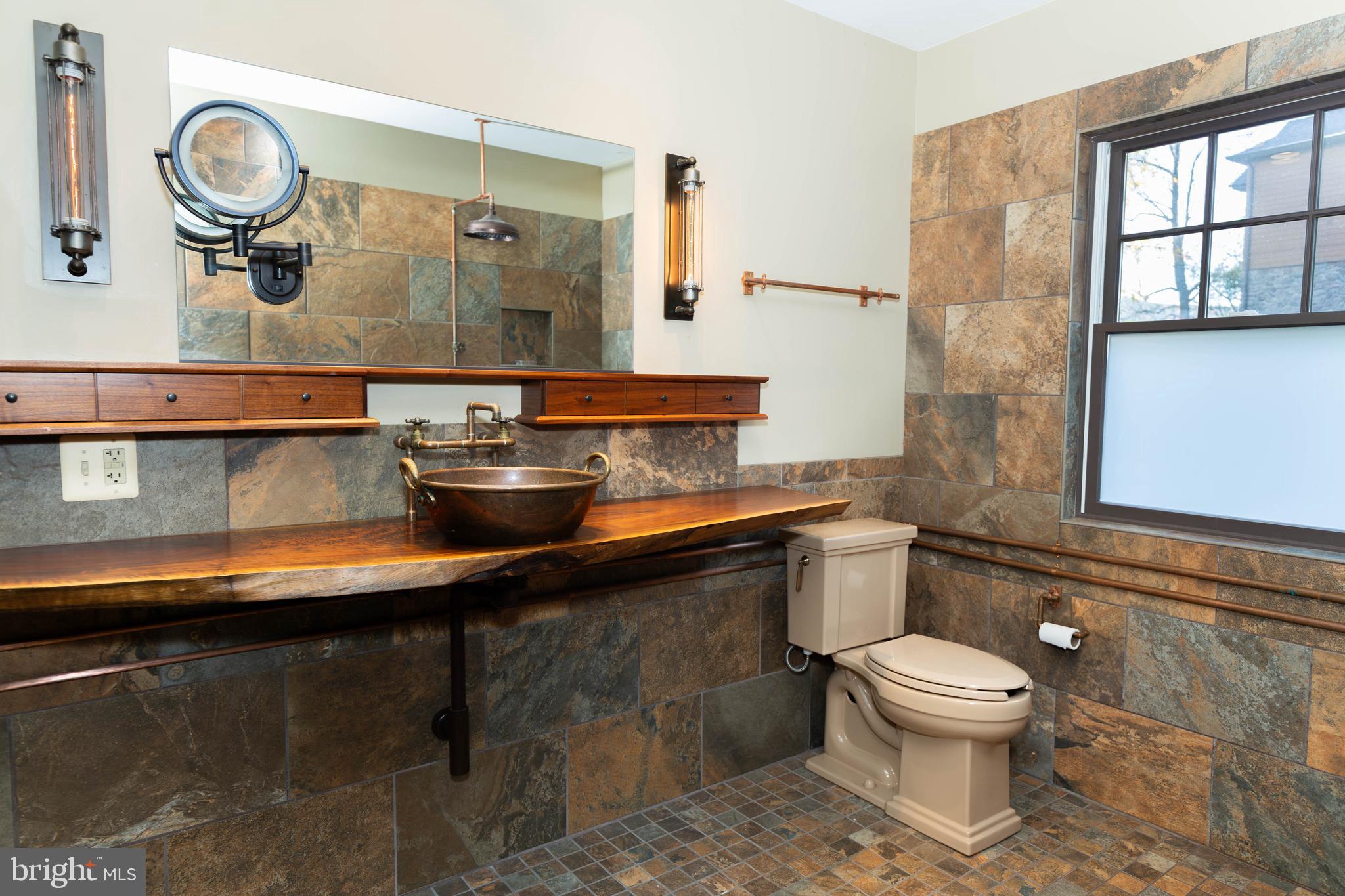 1312 John Rissler Road Charles Town, WV 25414 - Photo 17 of 24 a bathroom with a toilet sink and mirror
