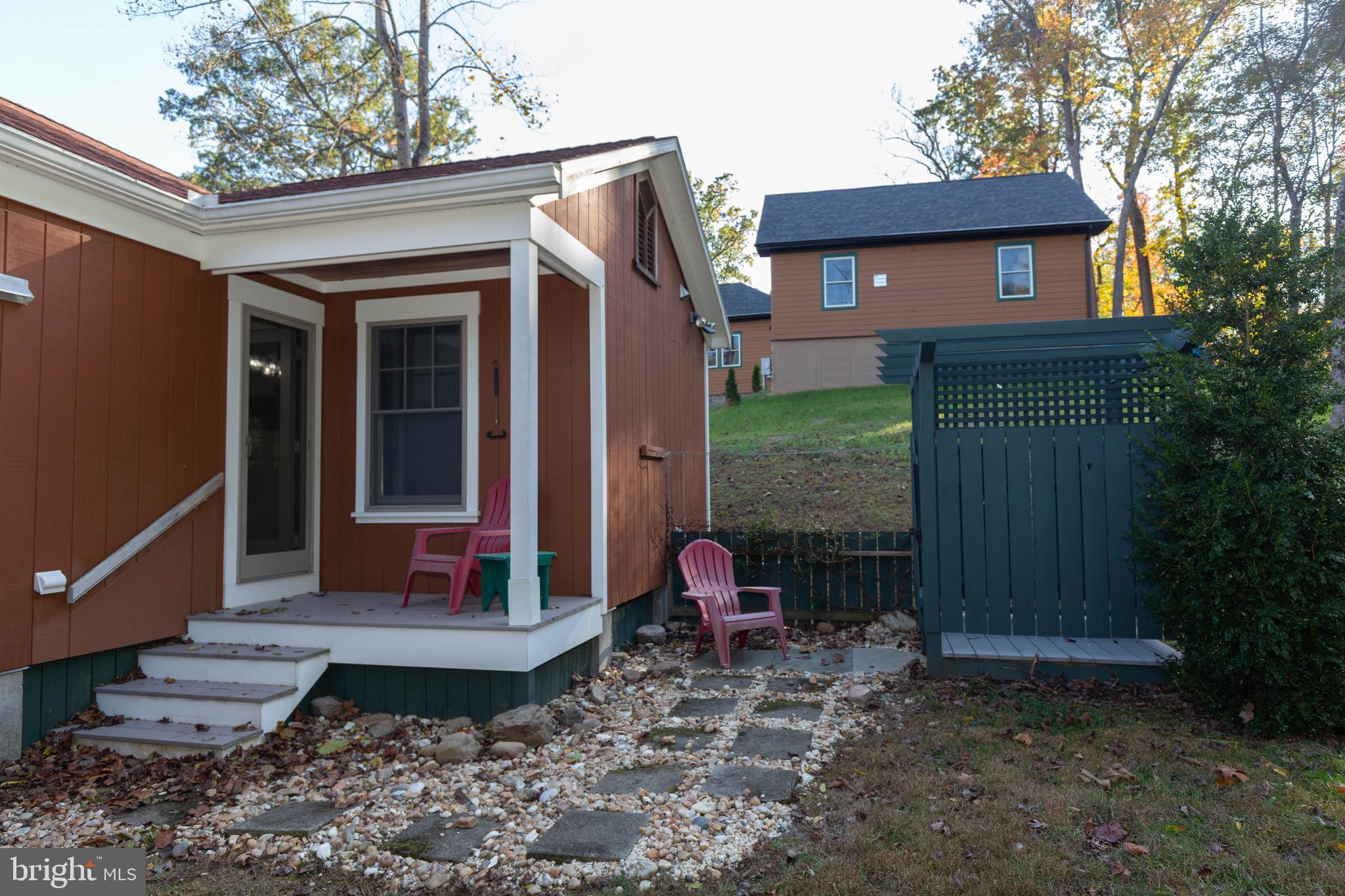 1312 John Rissler Road Charles Town, WV 25414 - Photo 18 of 24 a backyard of a house with seating space