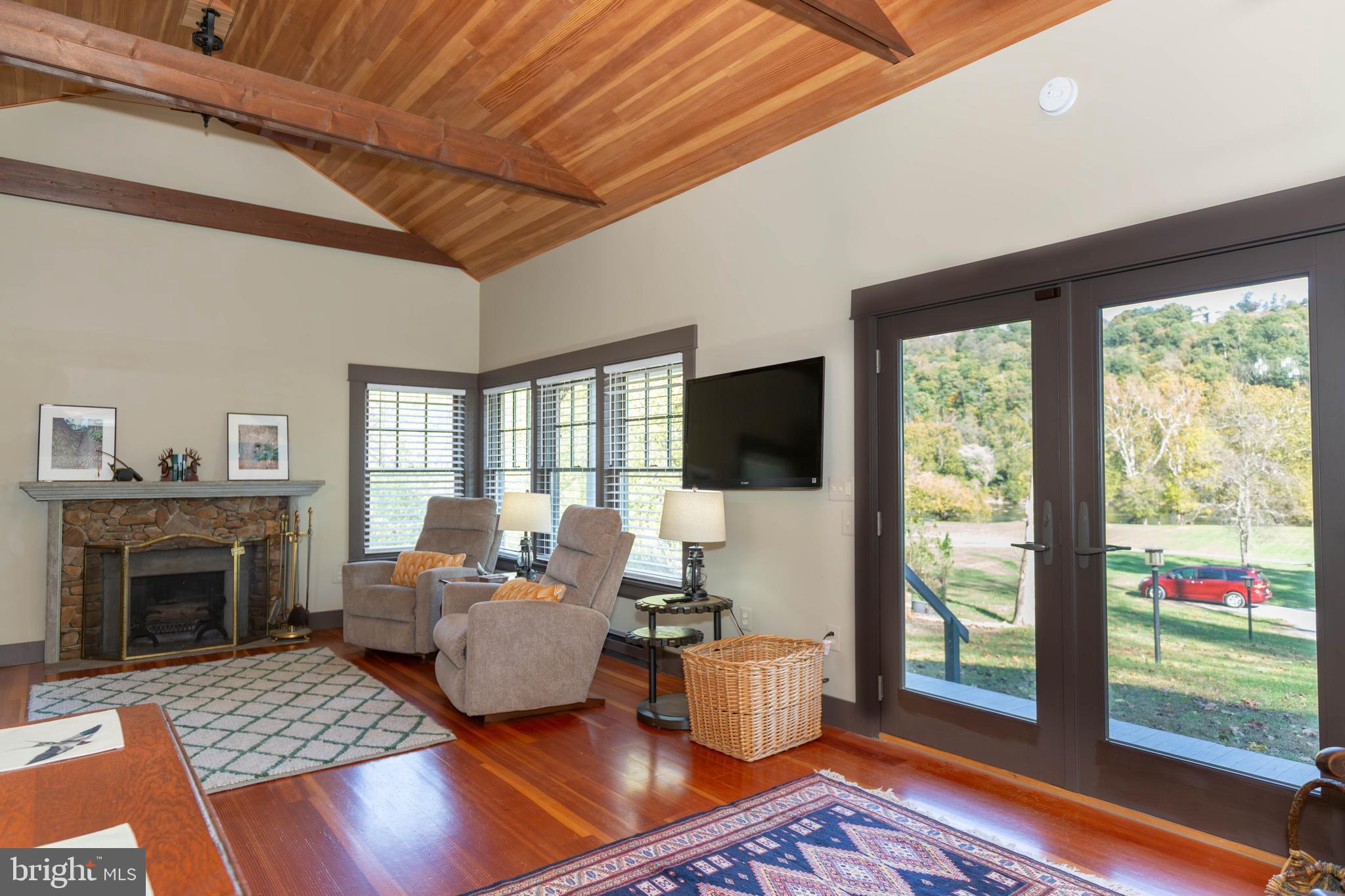 1312 John Rissler Road Charles Town, WV 25414 - Photo 4 of 24 a living room with furniture fireplace and a large window