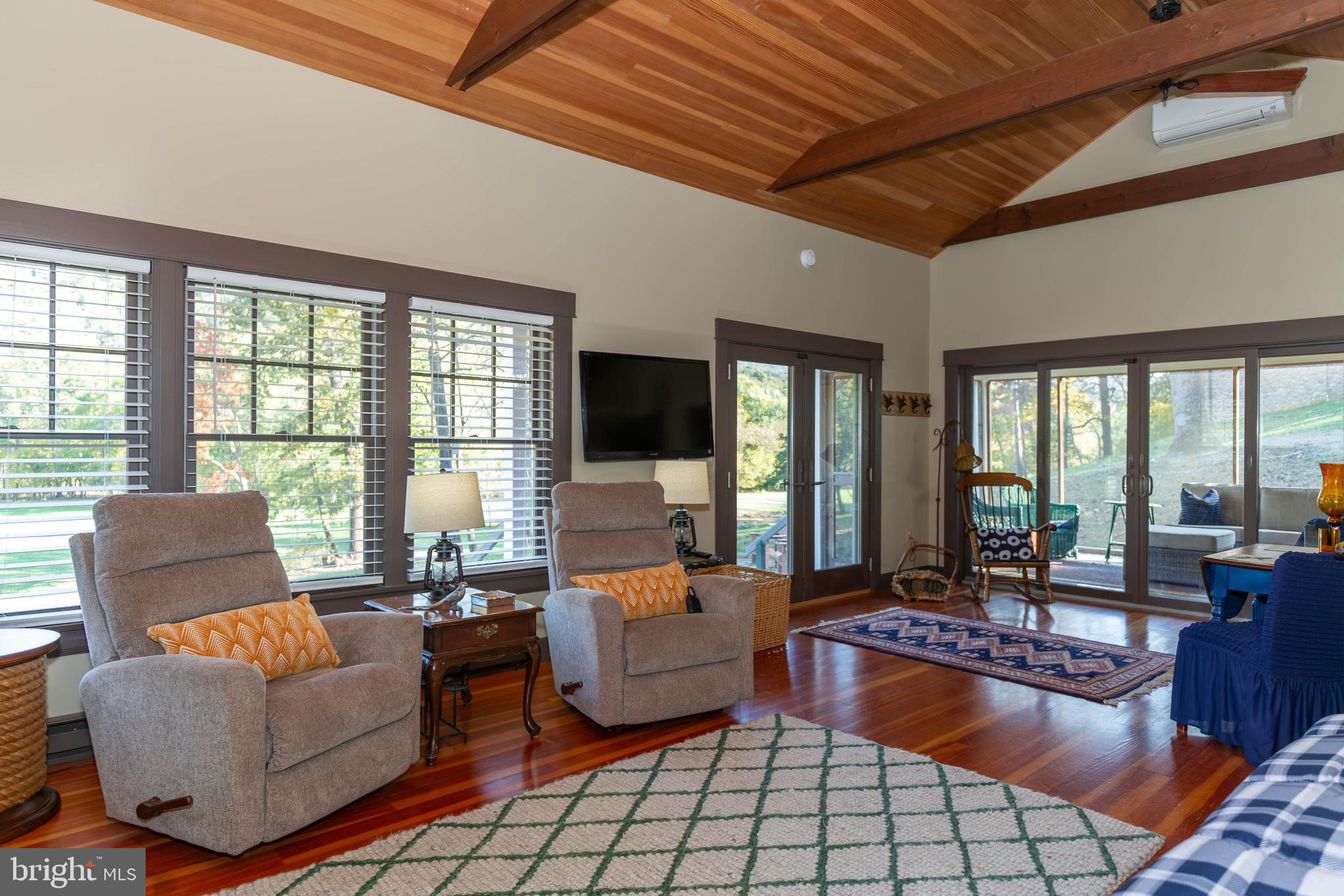 1312 John Rissler Road Charles Town, WV 25414 - Photo 9 of 24 a living room with furniture and large windows
