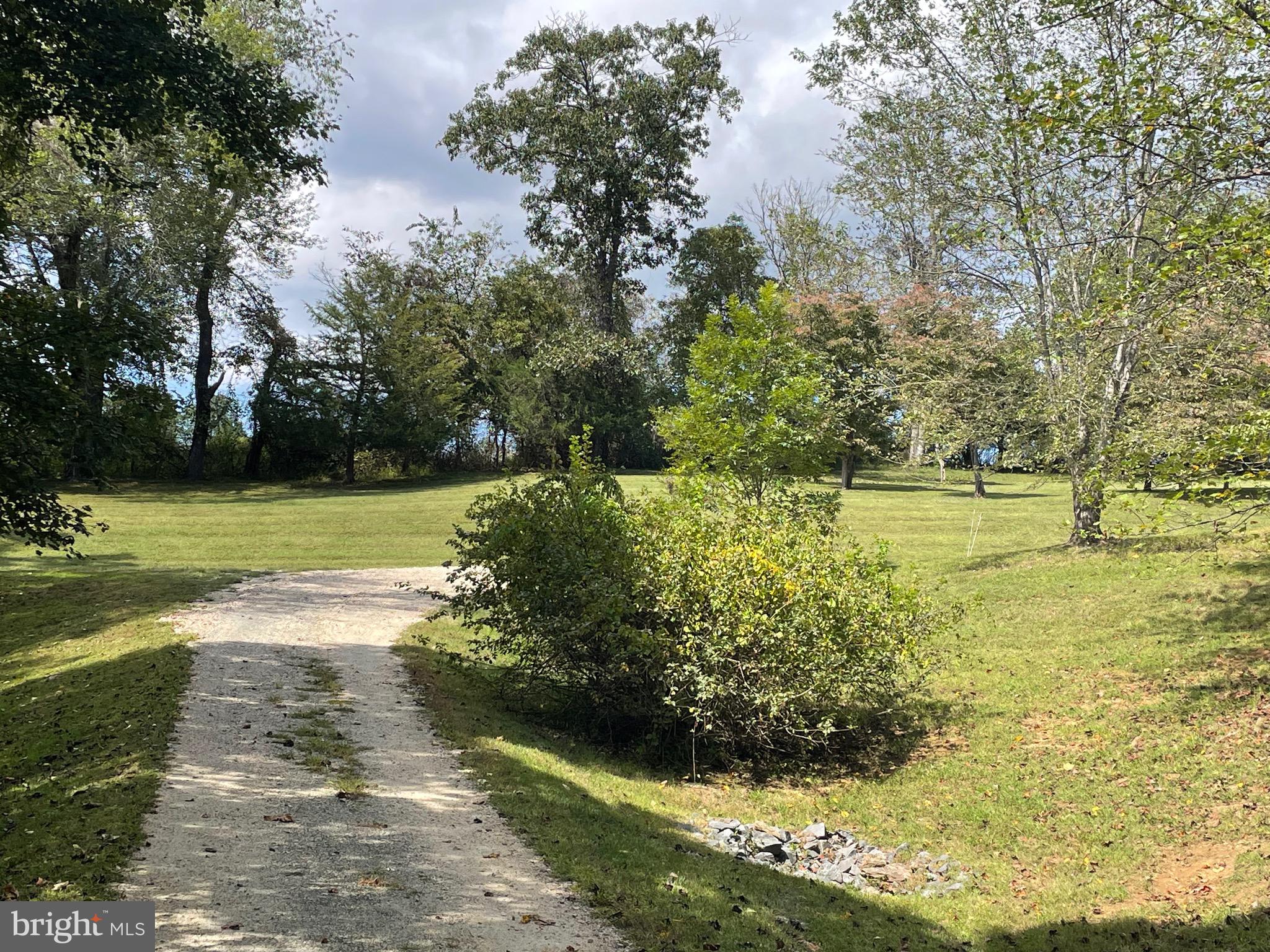 821 Long Mountain Road Washington, VA 22747 - Photo 23 of 24 a view of a lake with a yard