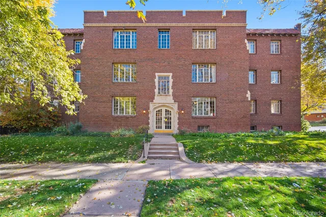 a front view of a house with yard