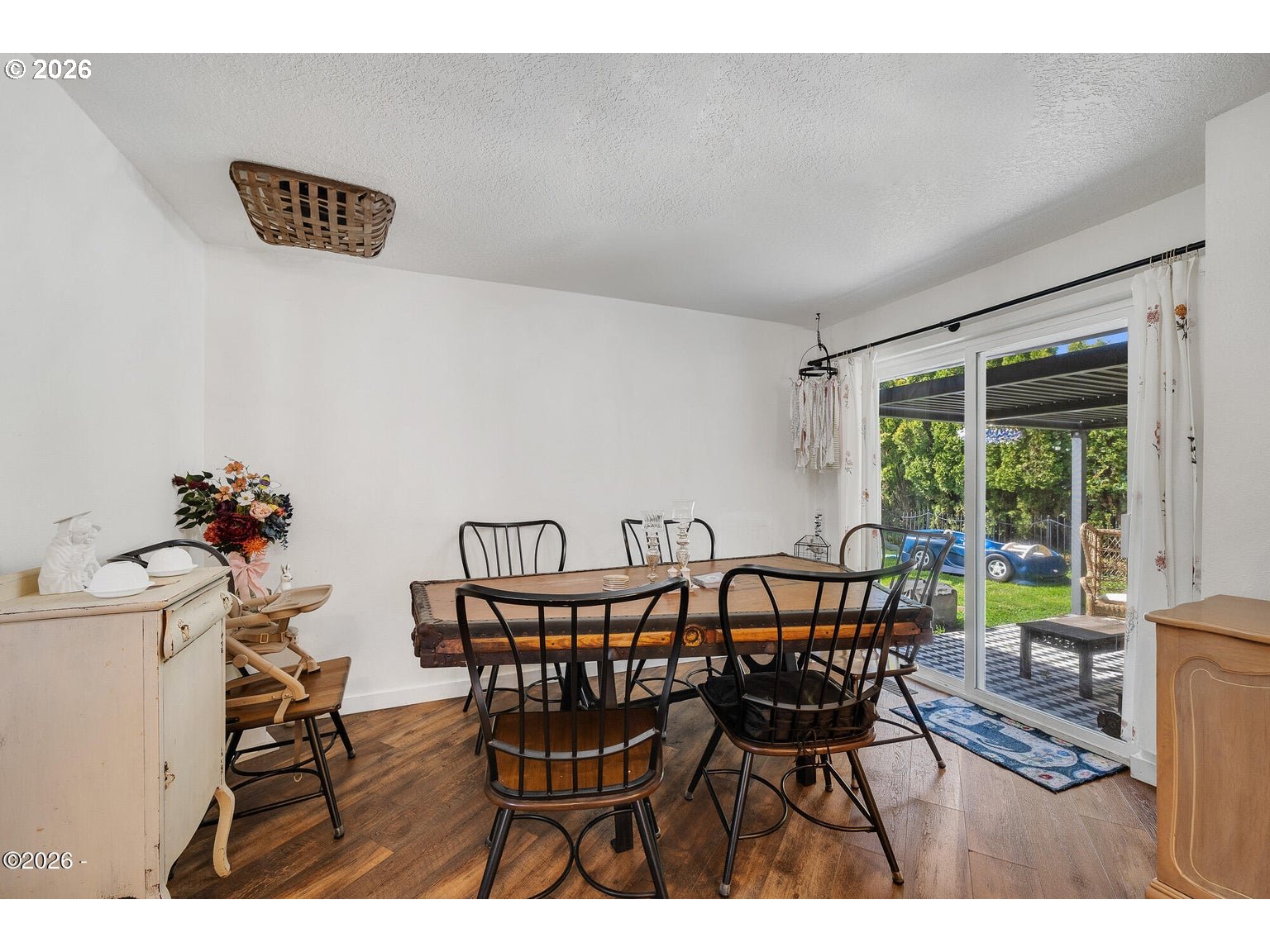 1202 North First Avenue Rockaway Beach, OR 97136 - Photo 9 of 28 a view of a dining room with furniture and a window