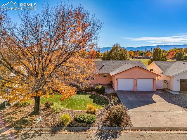a view of a house with a big yard