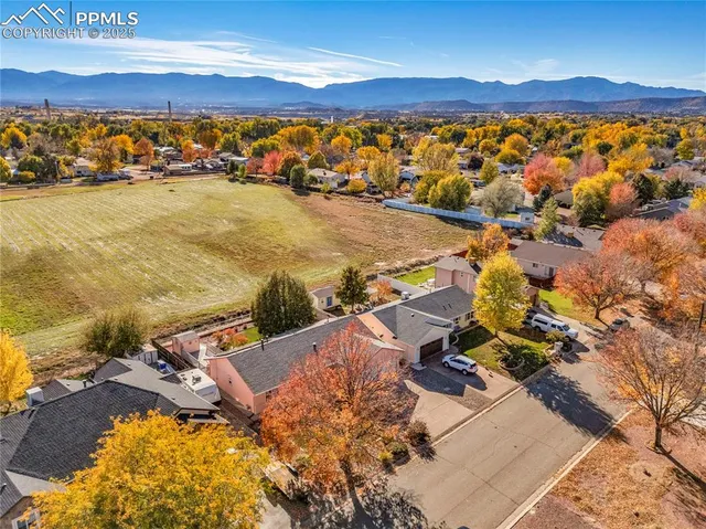a view of an ocean and a mountain
