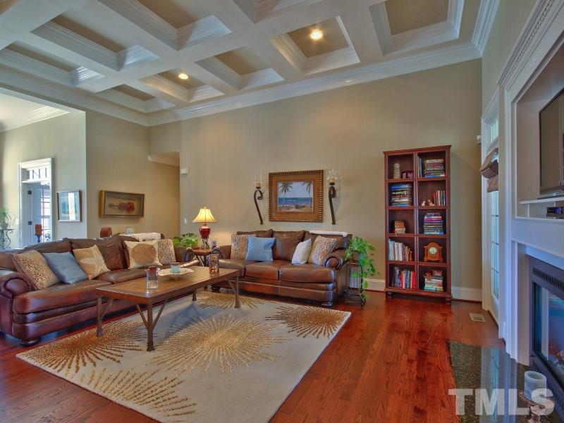 224 Waterville Street Raleigh, NC 27603 - Photo 11 of 25 a living room with furniture and wooden floor