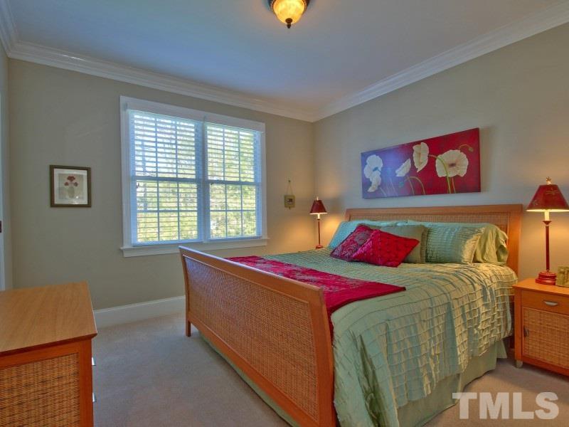 224 Waterville Street Raleigh, NC 27603 - Photo 16 of 25 a bedroom with a bed and window