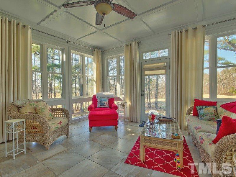 224 Waterville Street Raleigh, NC 27603 - Photo 22 of 25 a living room with furniture and a large window