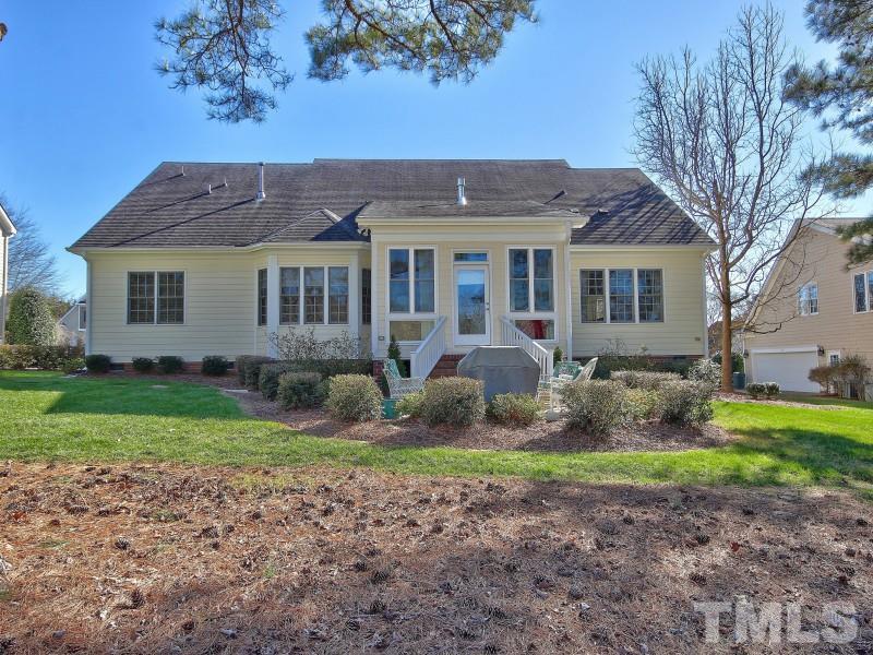 224 Waterville Street Raleigh, NC 27603 - Photo 23 of 25 a front view of a house with garden