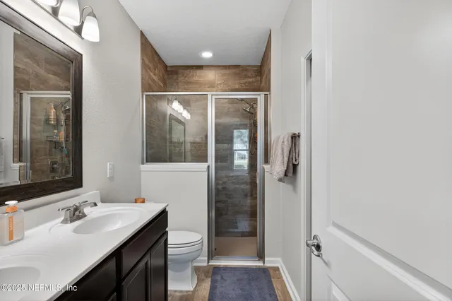 a view of a house with a yard and plants