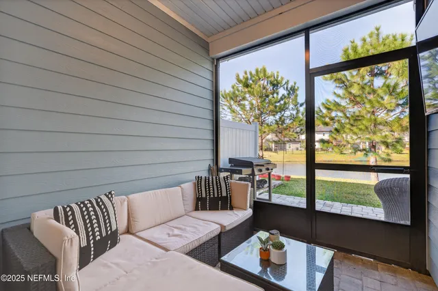 a view of multiple houses with outdoor space