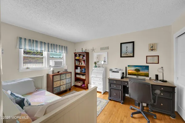 a workspace with furniture and window