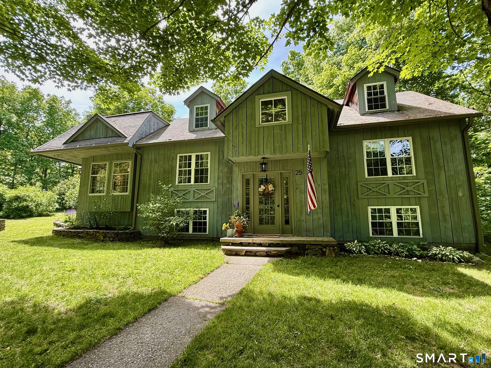 25 Bald Hill Road Kent, CT 06785 - Photo 1 of 38 a front view of a house with a yard