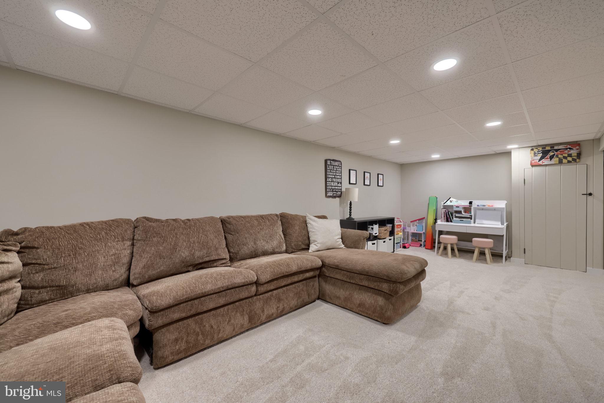 1019 Devonshire Road Lancaster, PA 17601 - Photo 28 of 35 a living room with furniture and a couch