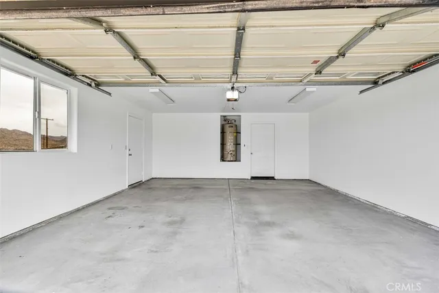 a view of a room with wooden walls